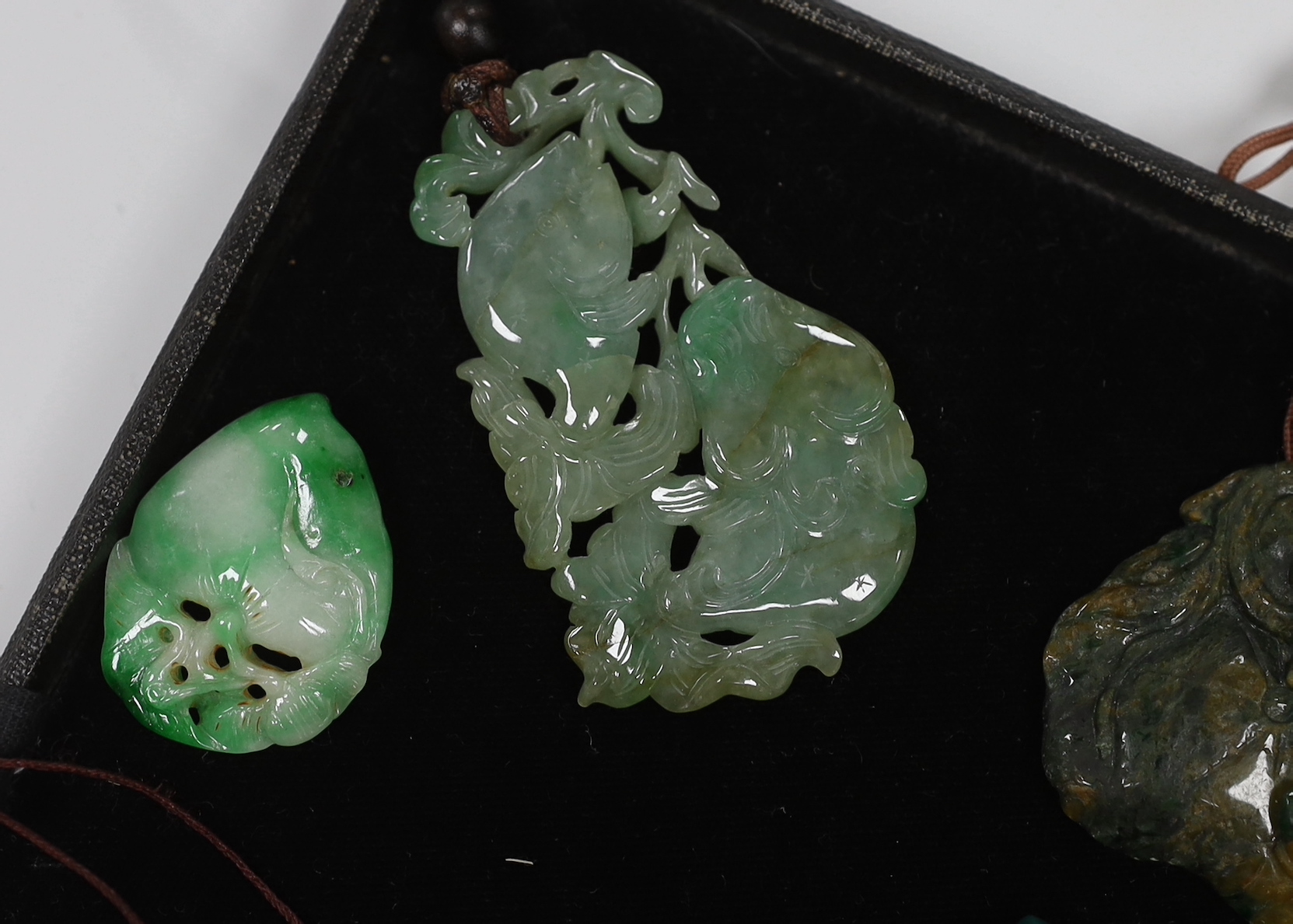 Fourteen Chinese jadeite carvings, largest 6.8cm